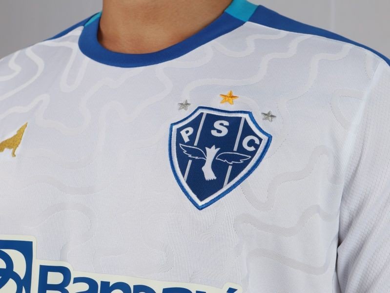 Por que o escudo do Paysandu tem um pé com asas? Conheça a história e o significado do símbolo bicolor